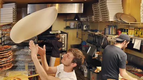 Why Robotic Pizza Makers Are Struggling to Replace Human Workers